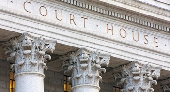 Attention Board Members: Case Law Update Facade of courthouse with columns.