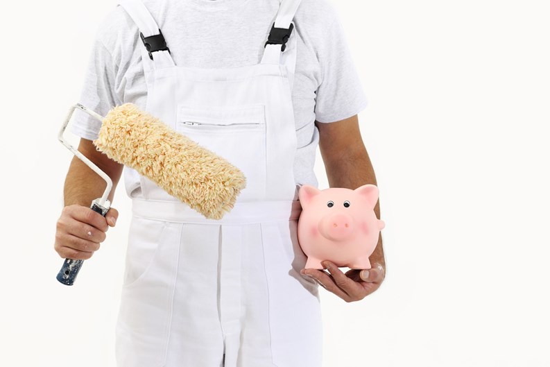 painter man with roller brush and piggy bank, isolated on white, saving concept