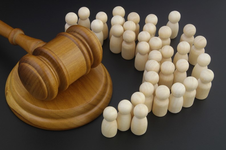 Court and civil law concept. Crowd of people and judge gavel.