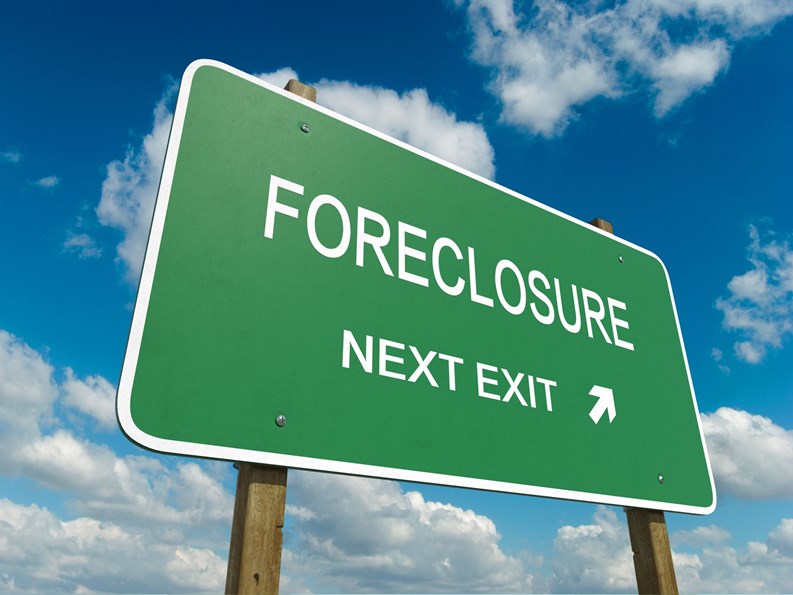 Road sign to foreclosure