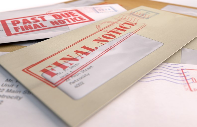 A 3D render of a scattered stack of regular envelopes with delivery stamps and a clear window and the top one saying payment due symbolizing bills and debt on an isolated white background