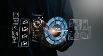 Upgrading to Self-Operating Systems Smart home concept.Hand of man using smart home control app on mobile phone.Remote home control.Smart home technology.