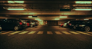 Who Pays for Garage Inspections & Repairs? Modern underground parking with cars