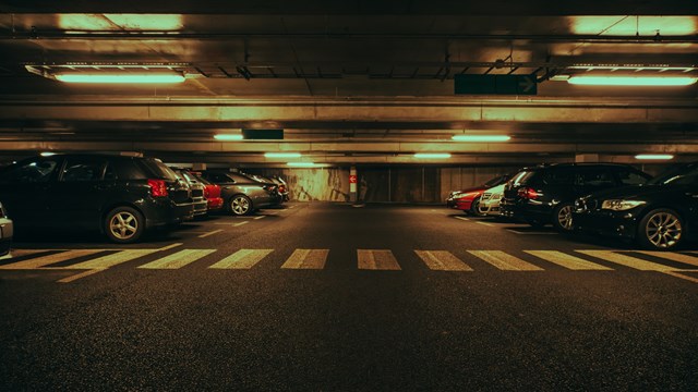 Modern underground parking with cars