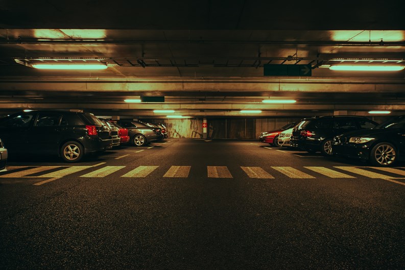 Modern underground parking with cars