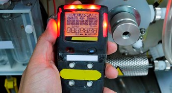 Local Law 157 Compliance Personal H2S Gas Detector,Check gas leak. Safety concept of safety and security system on offshore oil and gas processing platform, hand hold gas detector for check hydrocarbon leak to protect fire and explosion.