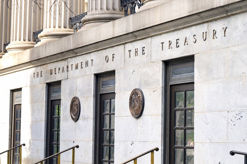 Washington DC, USA - 2 May 2024: Front exterior view of the entrance to the Department of the Treasury building in Washington DC