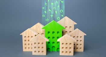 Local Law 97 Green building stands out among the houses. Renovation and environmental improvement of old buildings. Net Zero Carbon neutrality. Environmentally friendly, energy efficient and zero emissions.