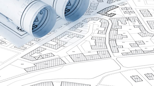 Imaginary cadastral map with buildings, land parcel and vacant plot - land records and property registry concept