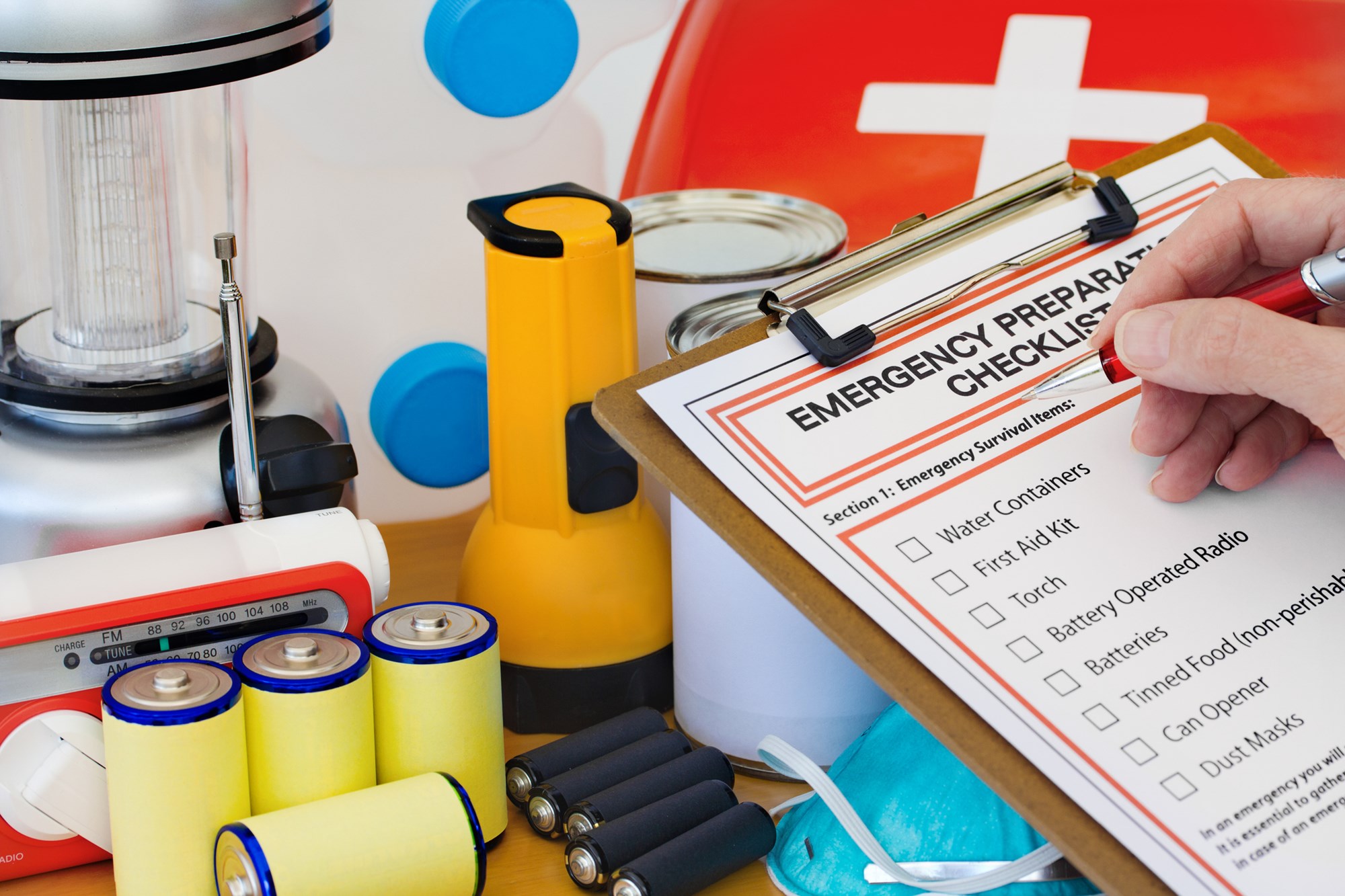 Ready for disaster - checking off the items on the emergency  preparedness form